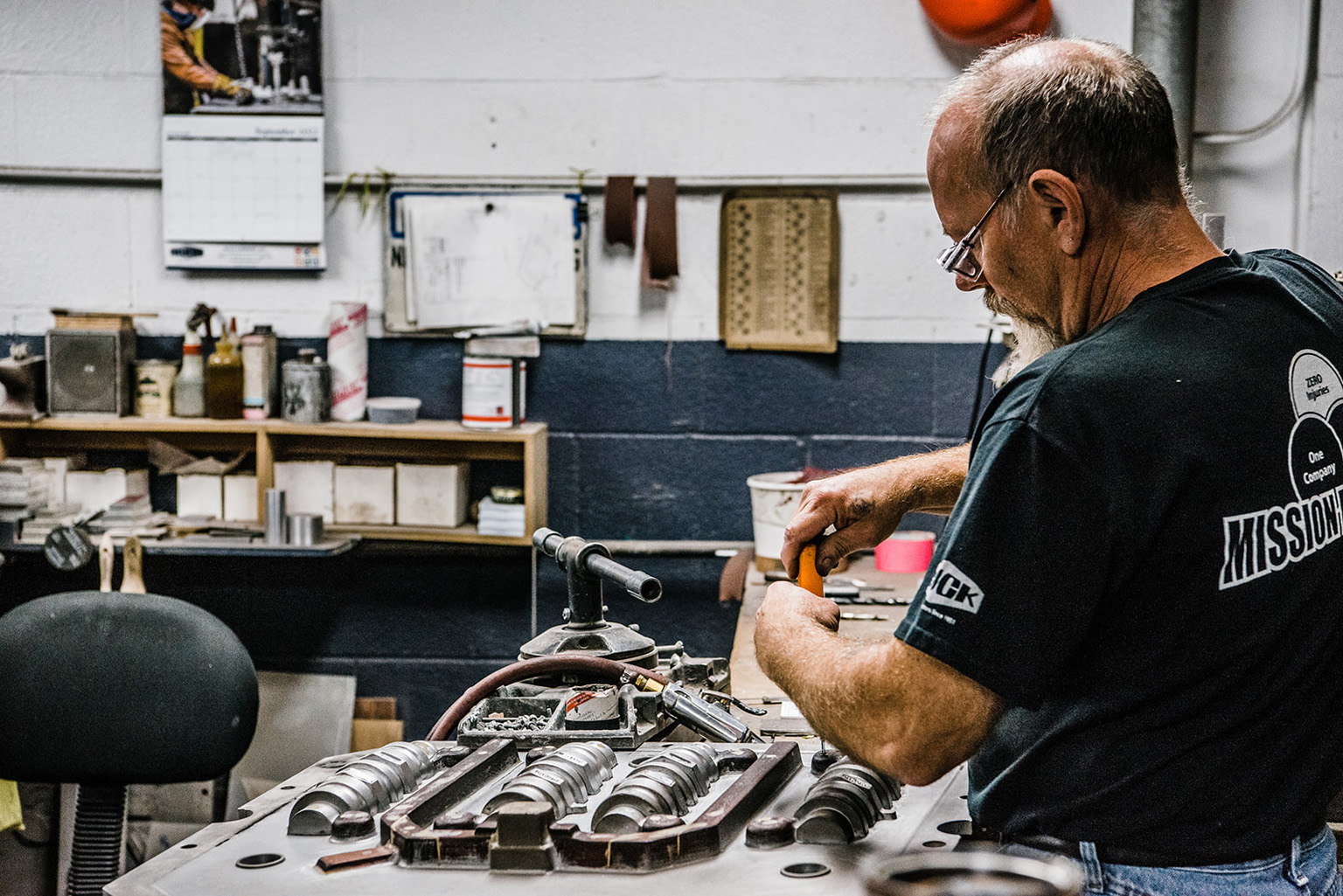 engineer working on parts