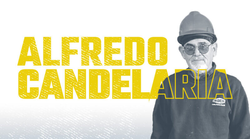 black and white picture of Alfredo Candelaria with his name in yellow